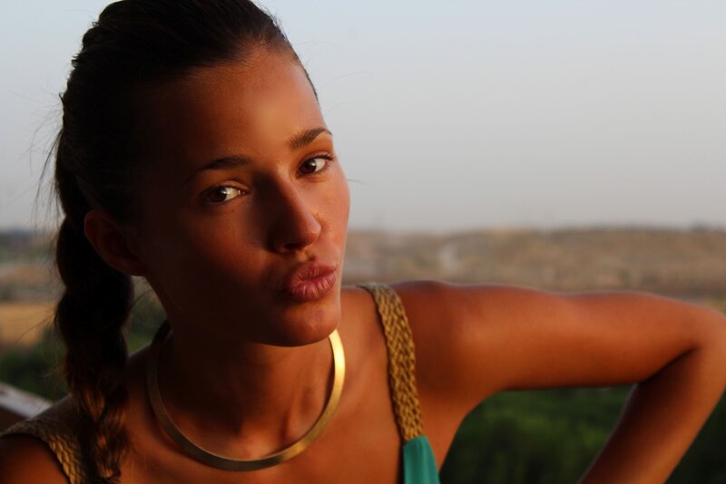 woman making a kissy face