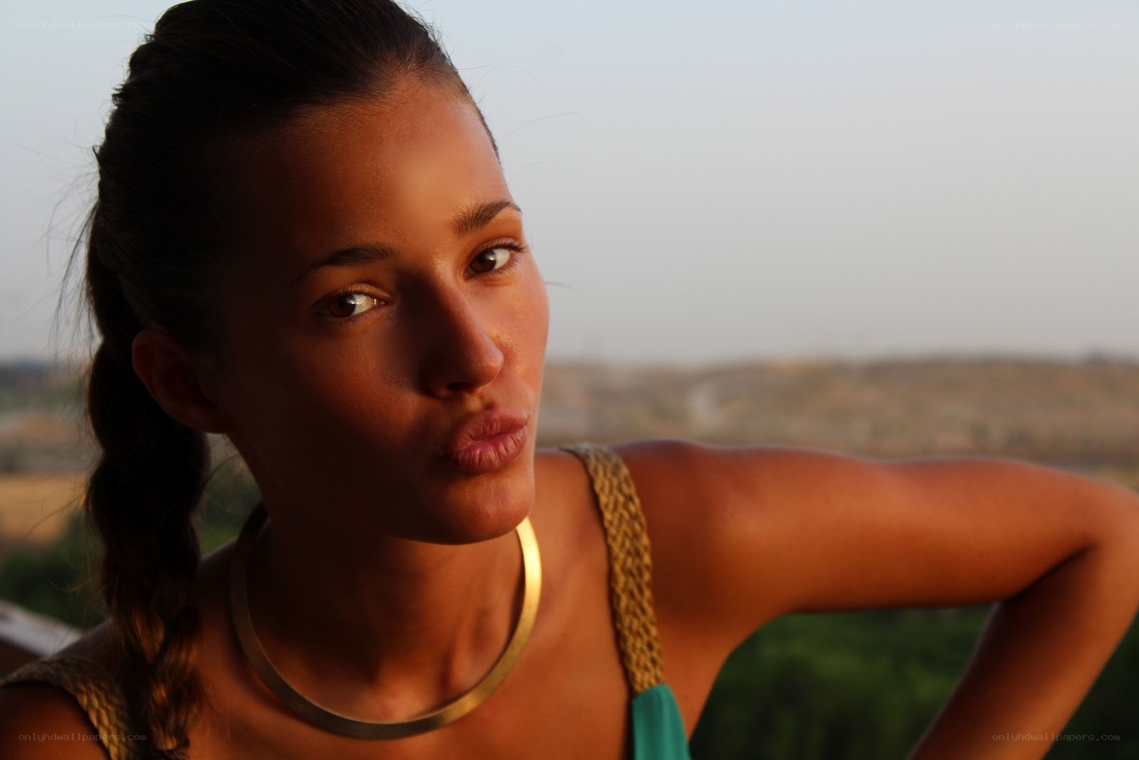 woman making a kissy face