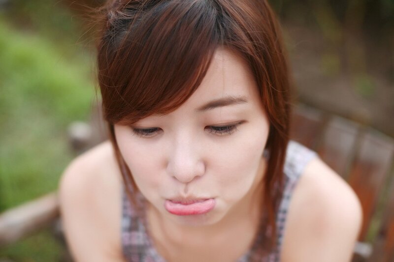 woman making a pouty face