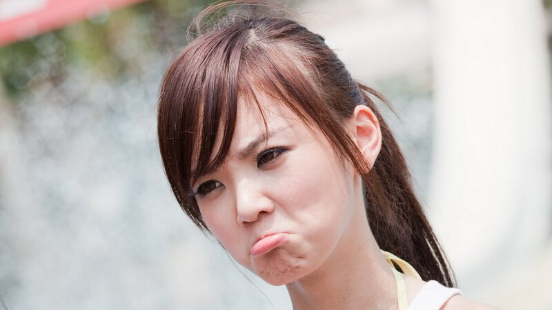 woman making a pouty face