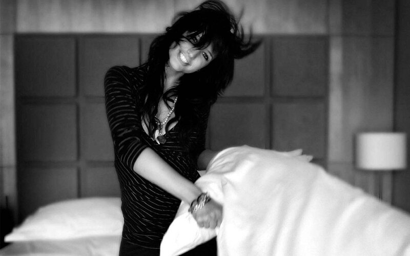 Woman Making Bed