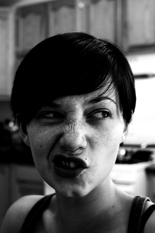 Woman Making Face — Black, Intense