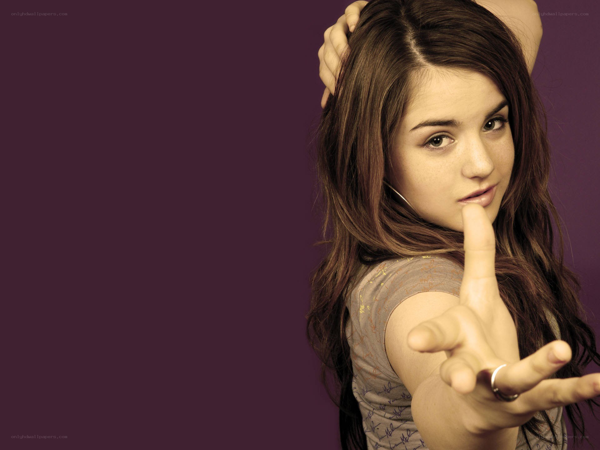 woman making hand gesture