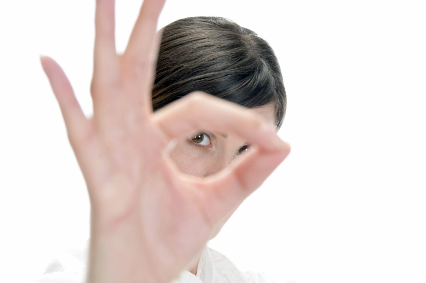 woman making hand gesture