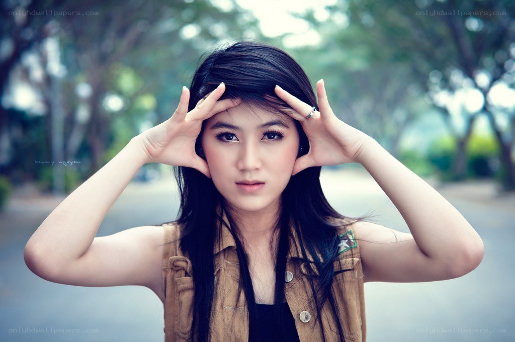 woman making hand gesture