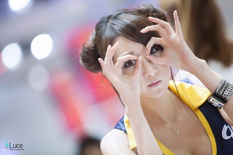 Woman Making Hand Gesture — Yellow