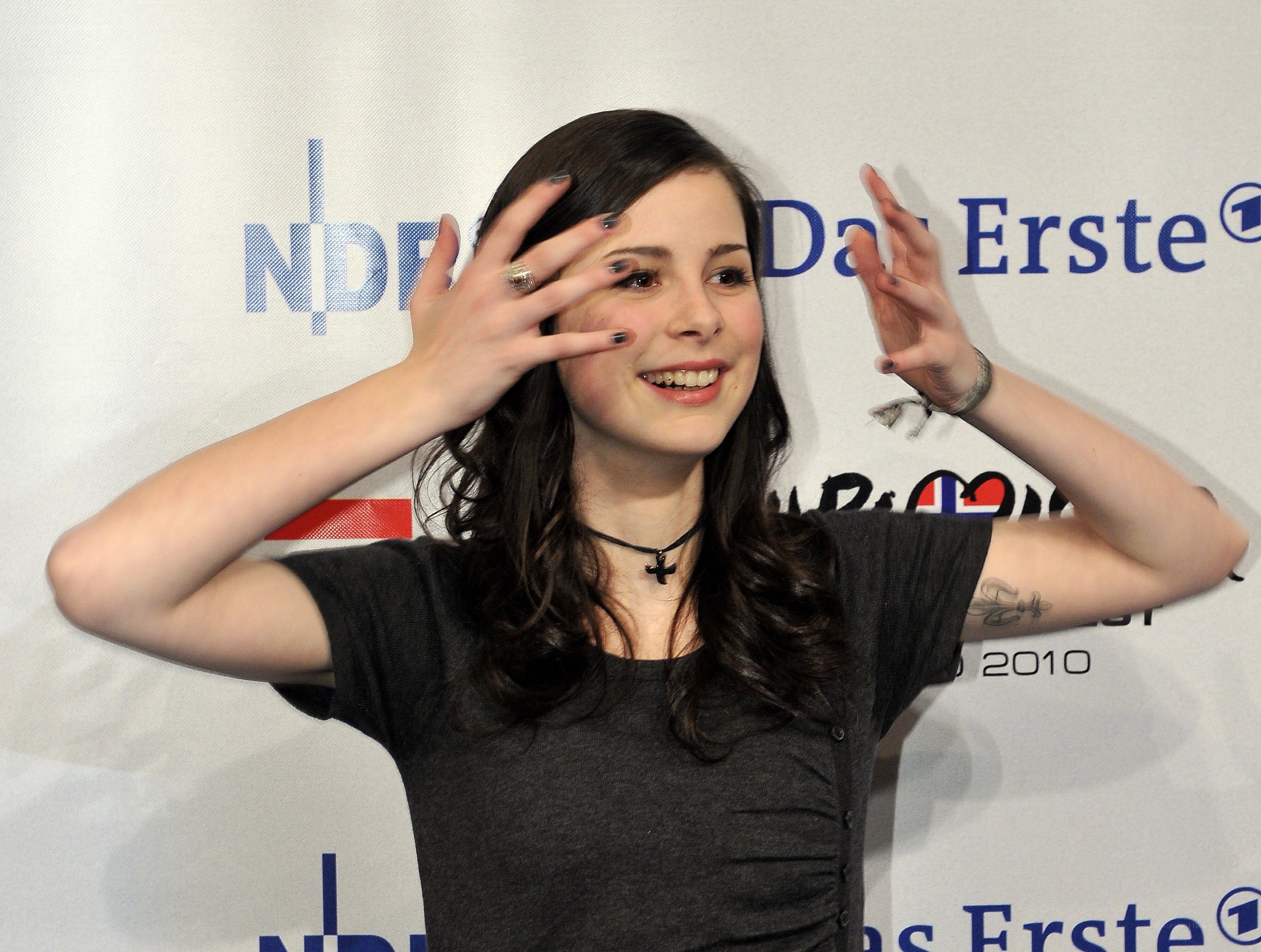 woman making hand gestures