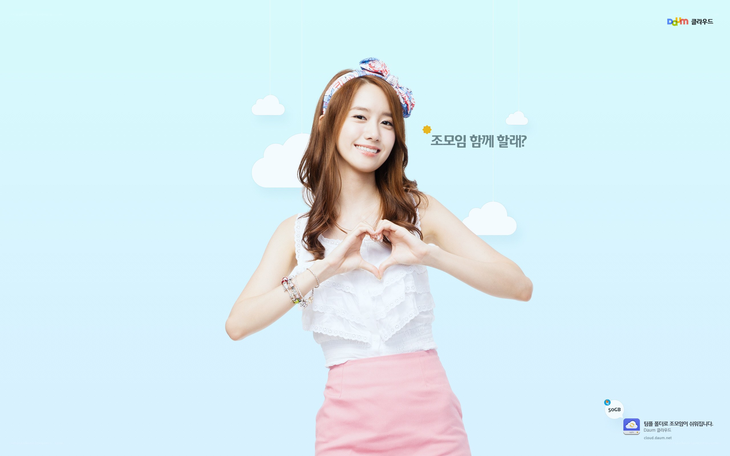 woman making heart gesture