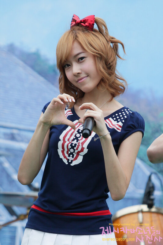 woman making heart gesture