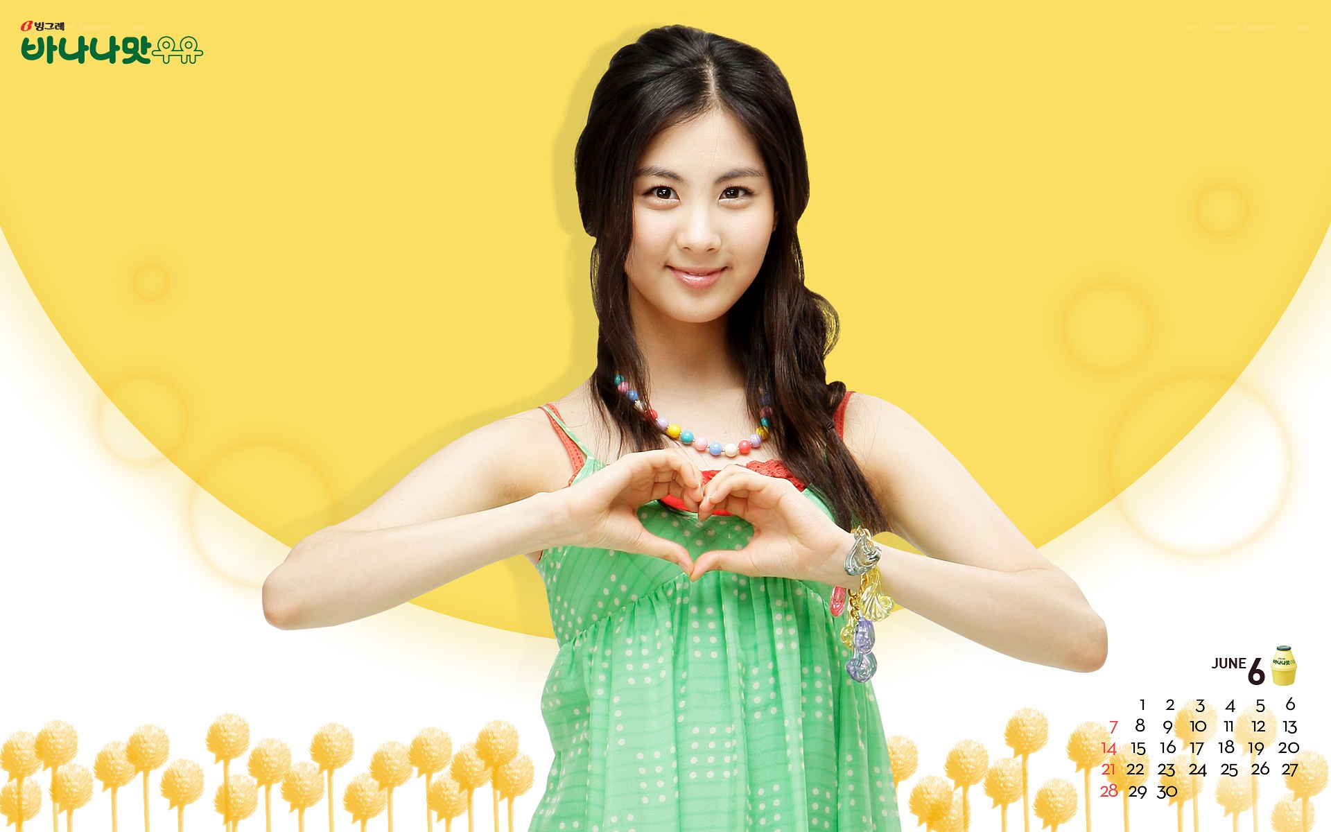 woman making heart shape