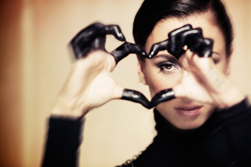 Woman Making Heart Shape — Black, Dramatic