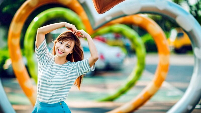Woman Making Heart Shape — Green