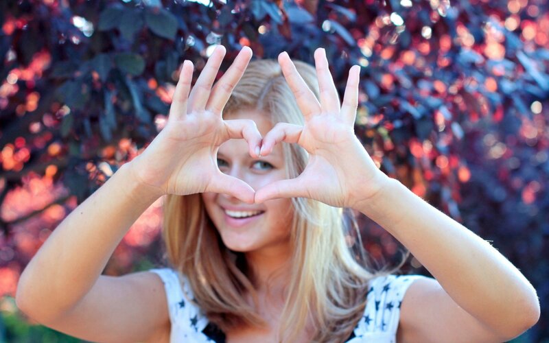 Woman Making Heart Shape — Red