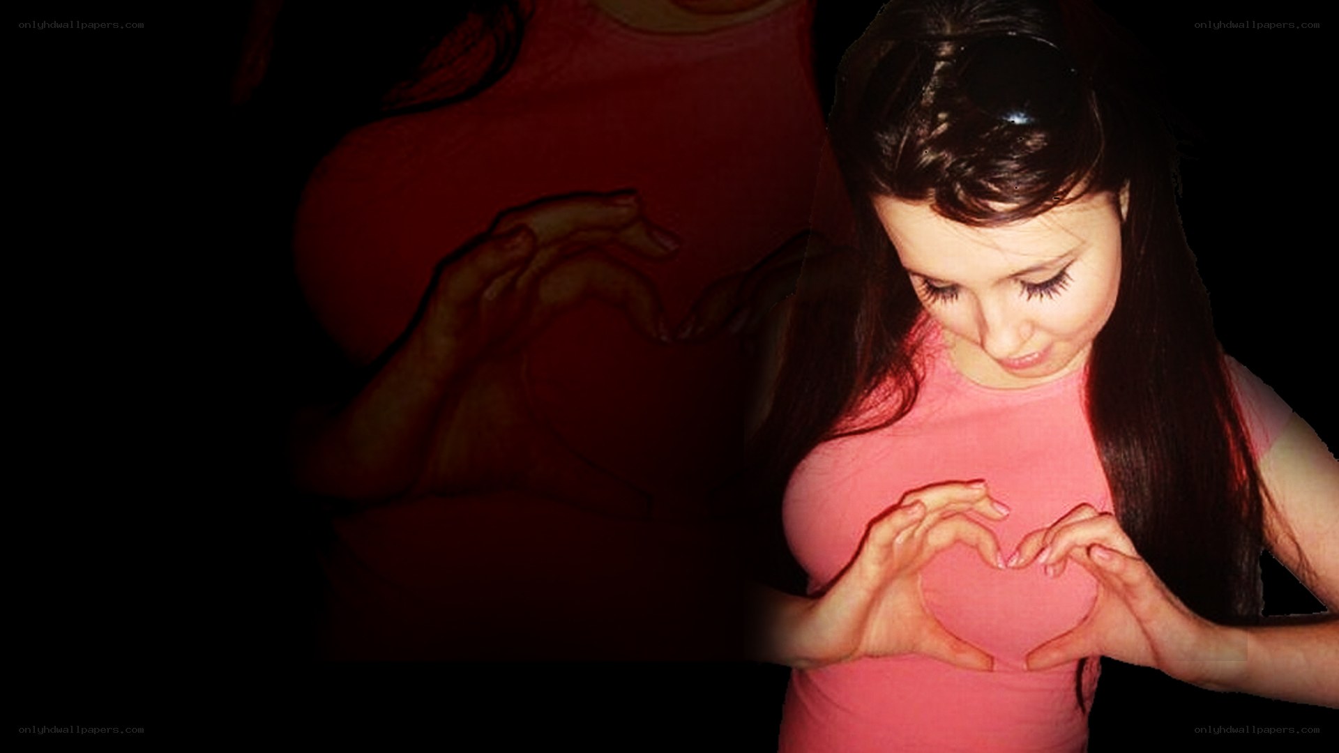 woman making heart shape with hands