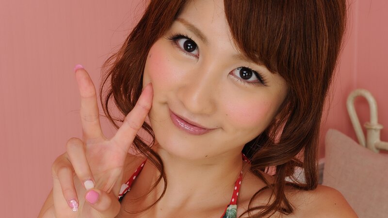 woman making peace sign
