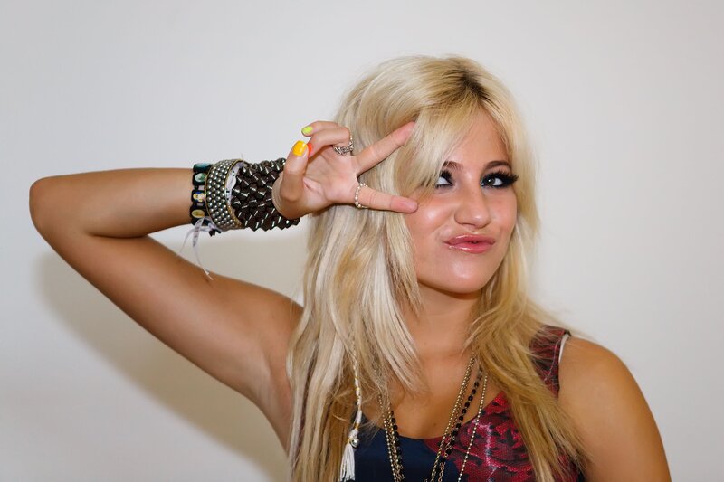woman making peace sign