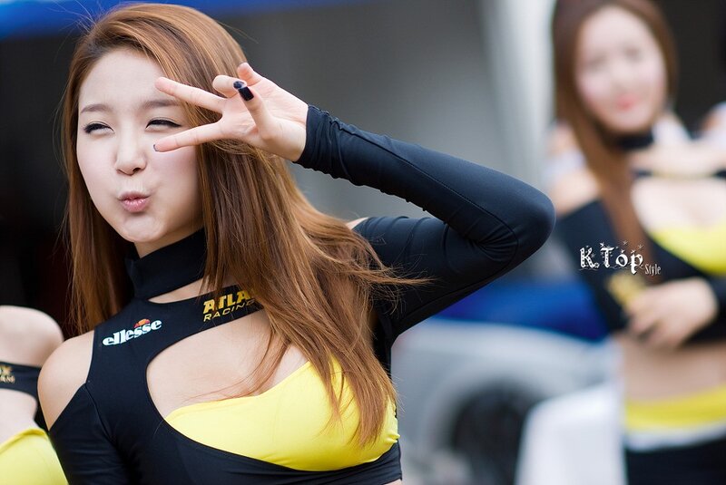 woman making peace sign