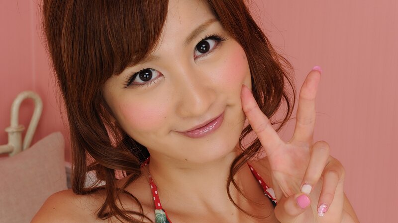 woman making peace sign