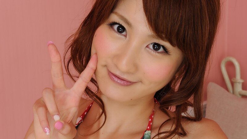 woman making peace sign