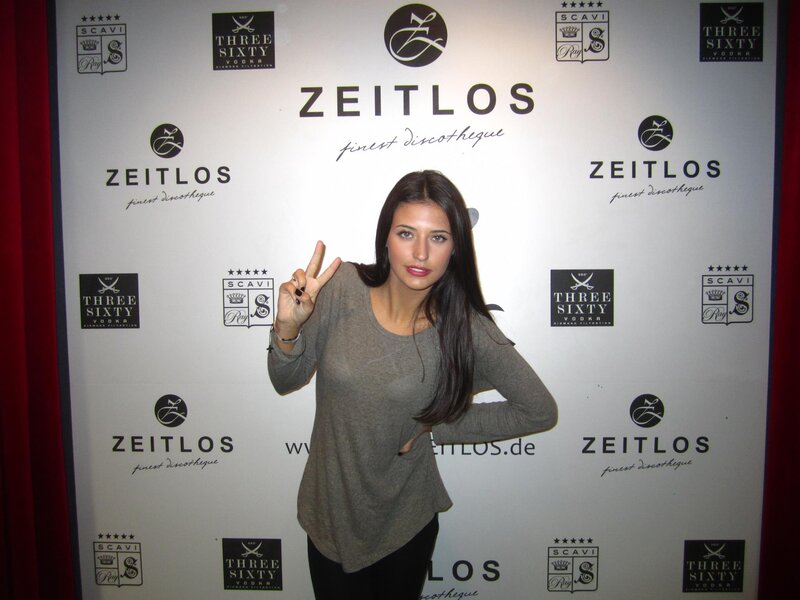 Woman Making Peace Sign — White