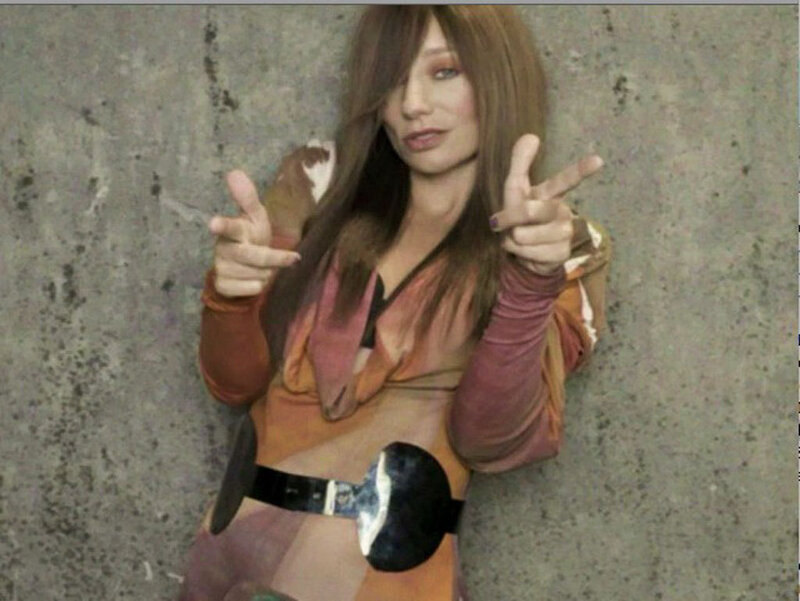 woman making peace signs