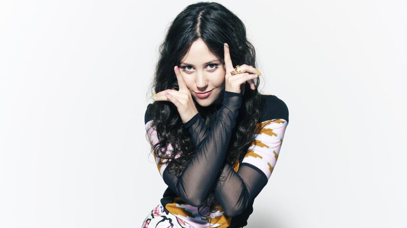 woman making peace signs