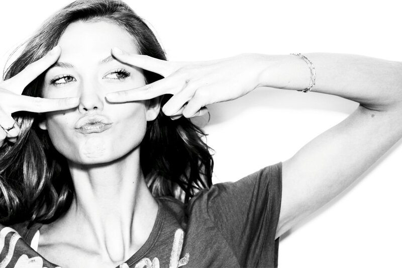 woman making peace signs