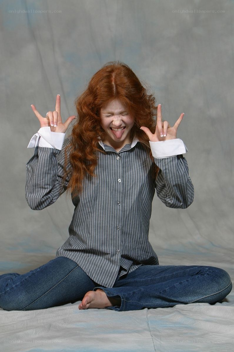 woman making rock gesture