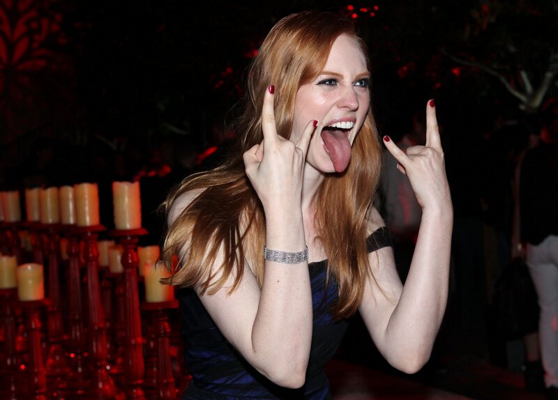 woman making rock gesture