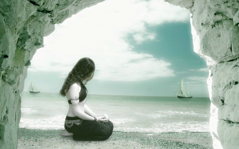 Woman Meditating on Beach — Green