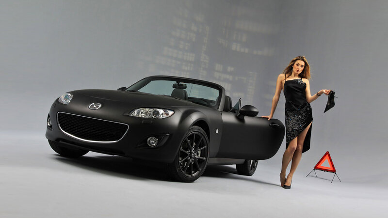 Woman Next to Black Car — Dramatic