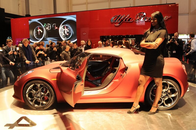 Woman Next to Red Car — Showroom