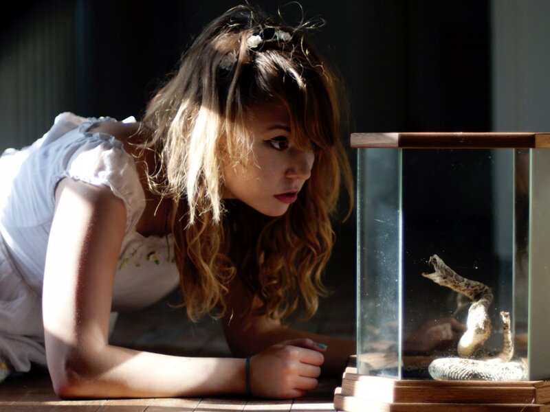 Woman Observing Snake