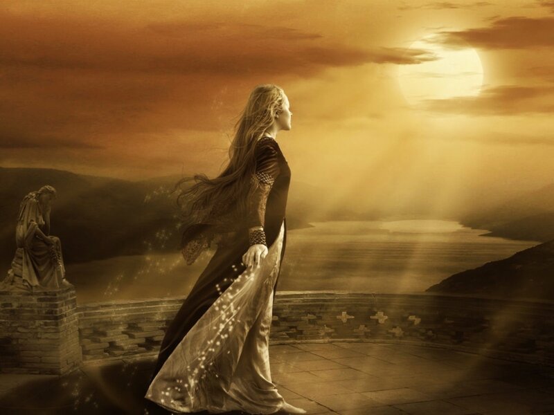 Woman on a balcony at sunset