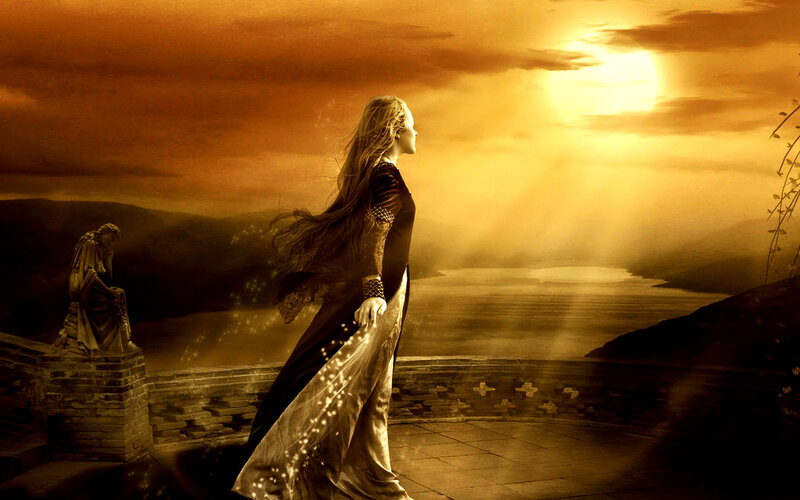 woman on a balcony at sunset