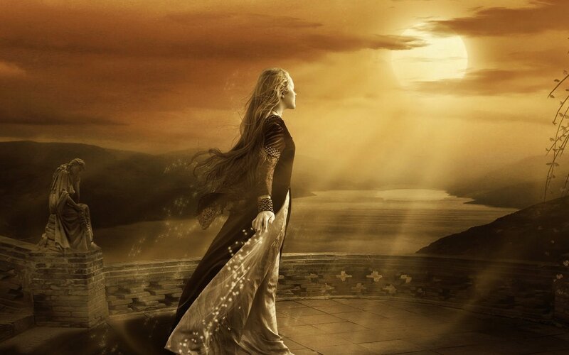 woman on a balcony at sunset