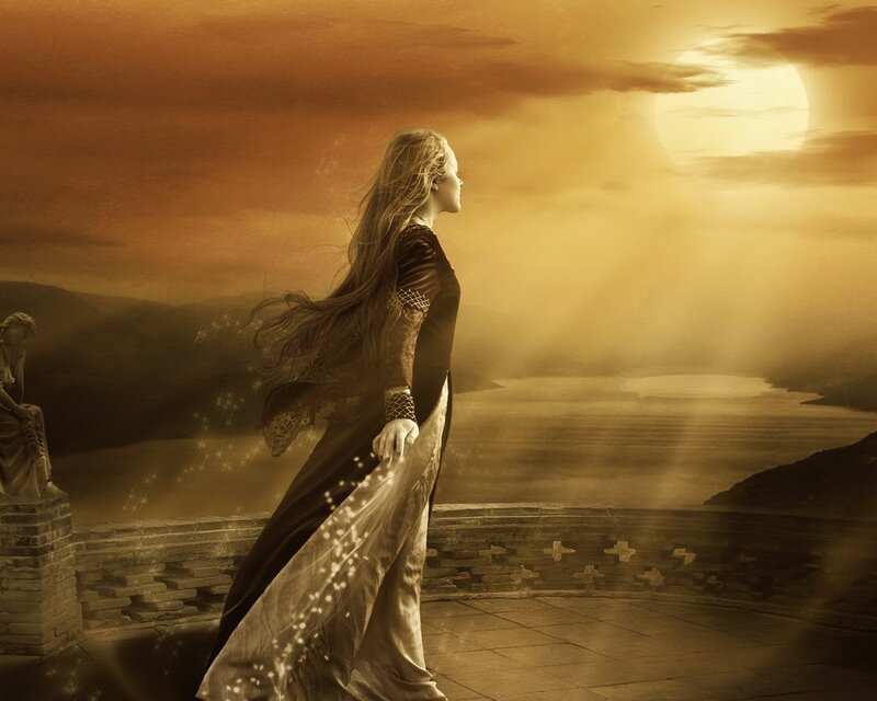 woman on a balcony at sunset