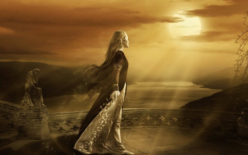 woman on a balcony at sunset