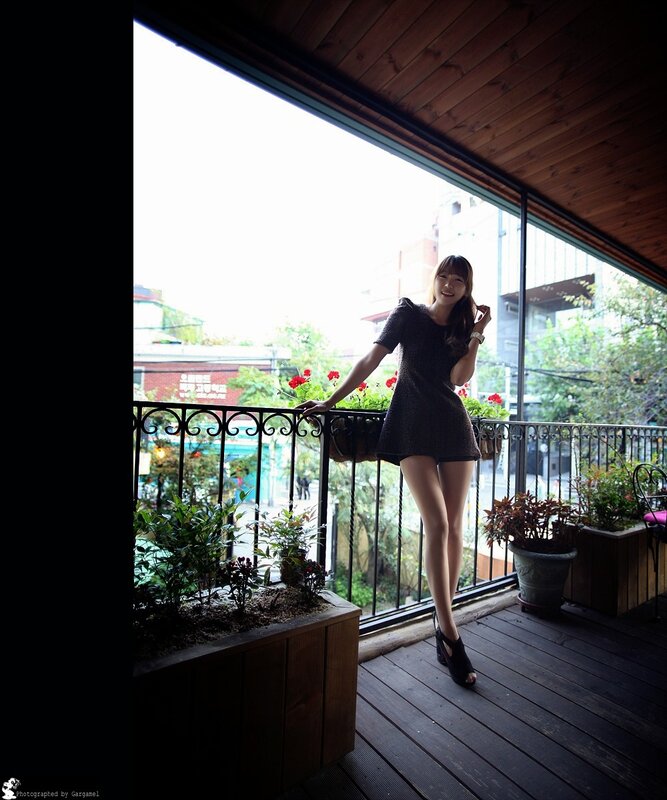 Woman on a balcony in Seoul