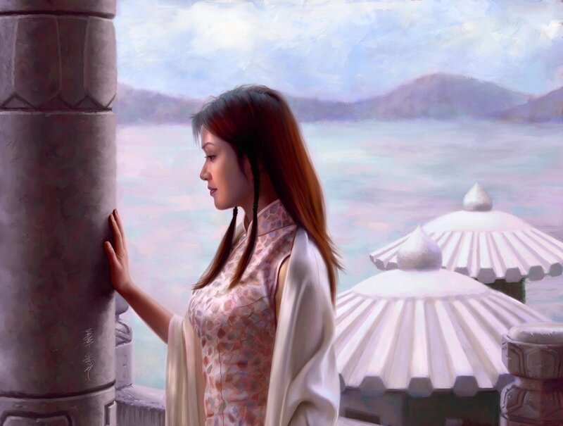 Woman on a balcony overlooking water