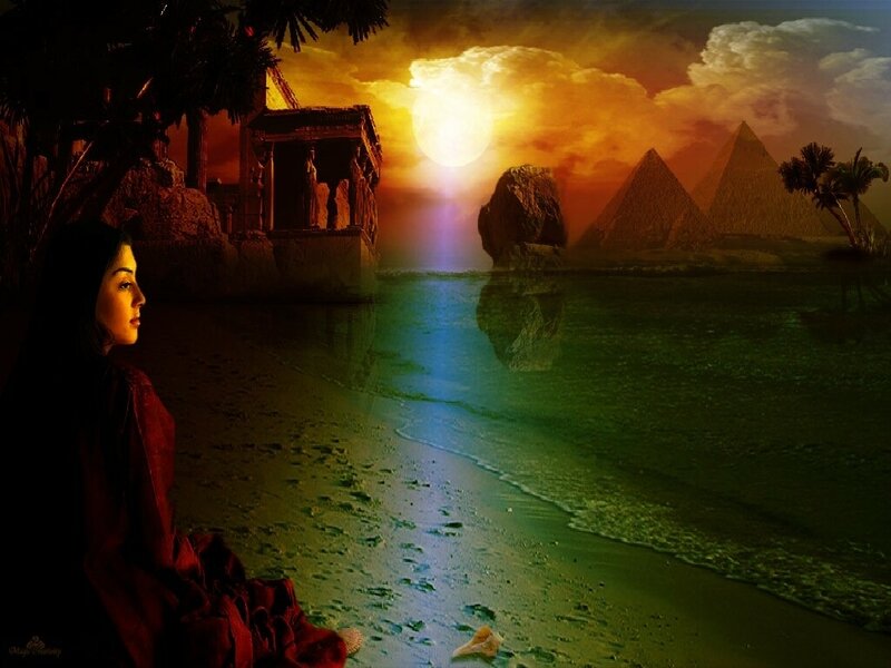 Woman on a beach at sunset