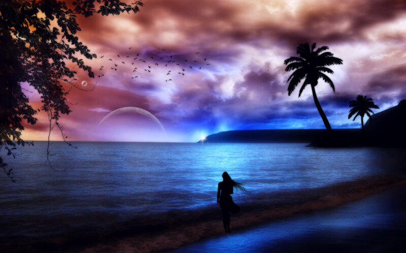 woman on a beach at sunset