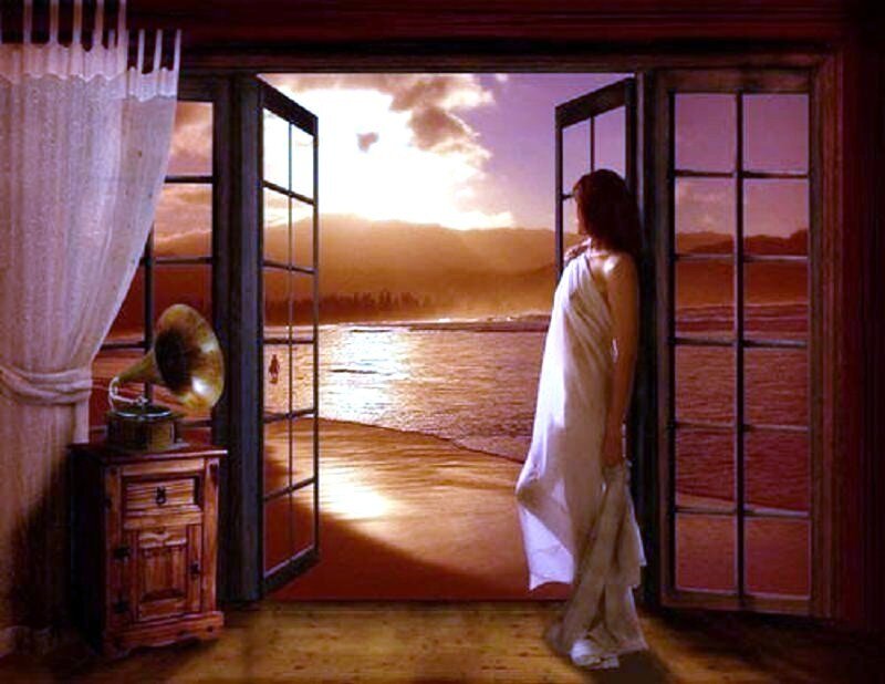 Woman on a beach at sunset