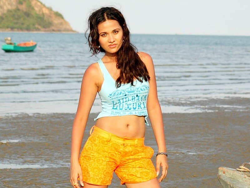 Woman on a beach in summer clothes