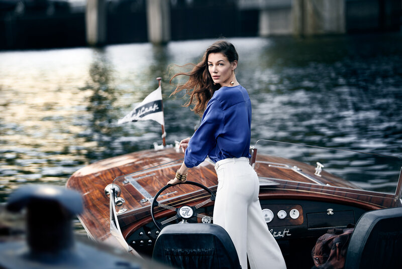 Woman on a Boat — Blue, Serene, Afternoon, Photograph