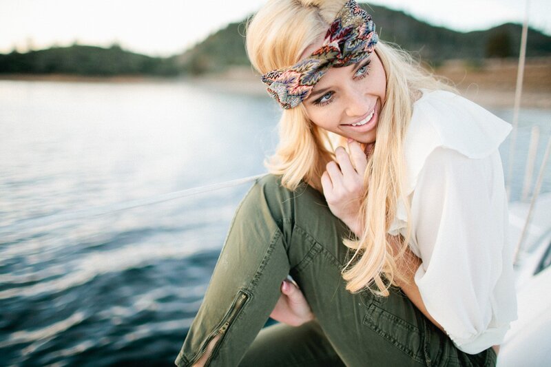 woman on a boat smiling