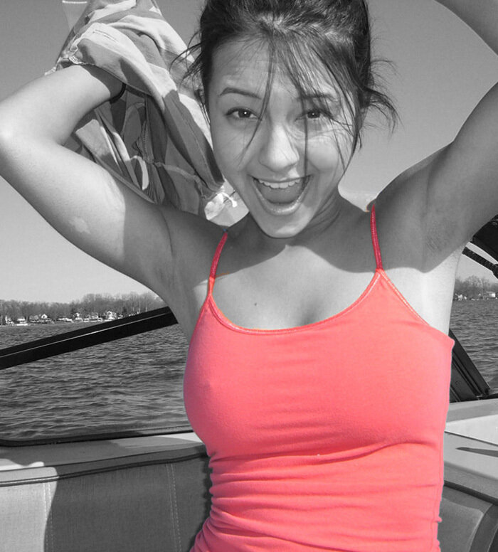woman on a boat smiling
