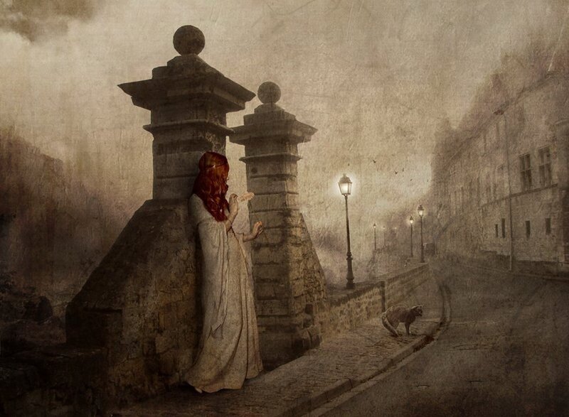 woman on a bridge at dusk