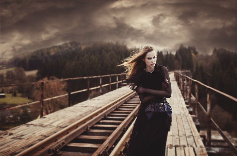 Woman on a Bridge — Brown, Dramatic