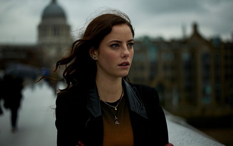 woman on a bridge in london